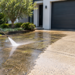 Concrete driveway being pressure washed by Shine Up Exterior Cleaning in Melbourne